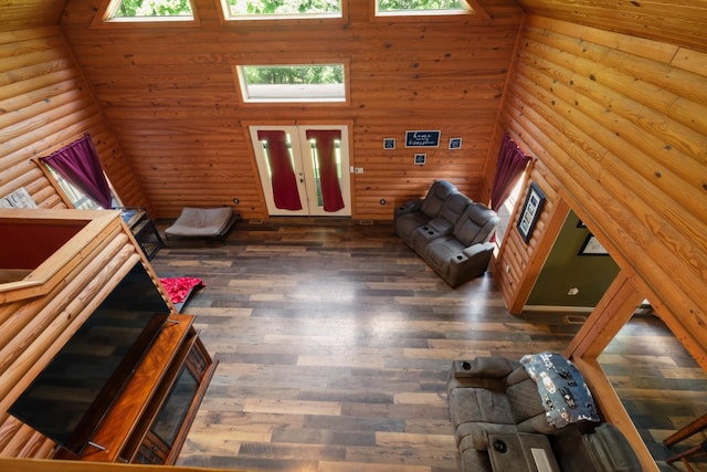 4357 Old Blacktop Rd, Mc Ewen, TN 37101 - unfurnished living room with wood finished floors, a high ceiling, and plenty of natural light