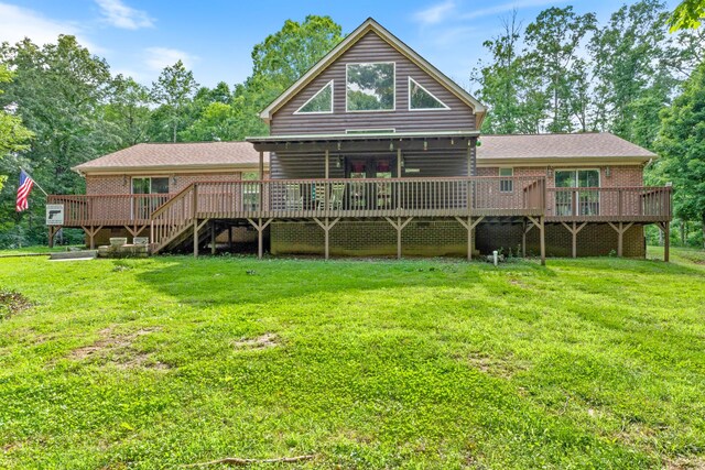 4357 Old Blacktop Rd, Mc Ewen, TN 37101 - back of house with a deck, a lawn, and brick siding