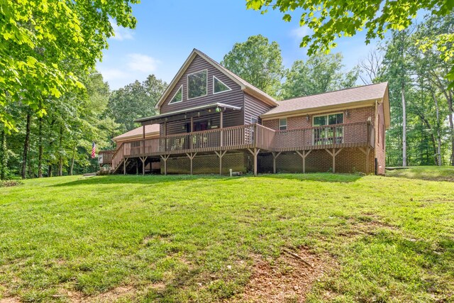 4357 Old Blacktop Rd, Mc Ewen, TN 37101 - rear view of property featuring a wooden deck, a yard, and brick siding