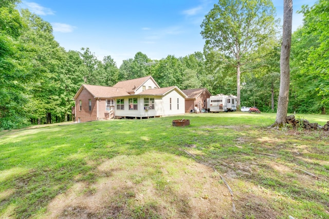 4357 Old Blacktop Rd, Mc Ewen, TN 37101 - view of front of property with a front lawn and a fire pit