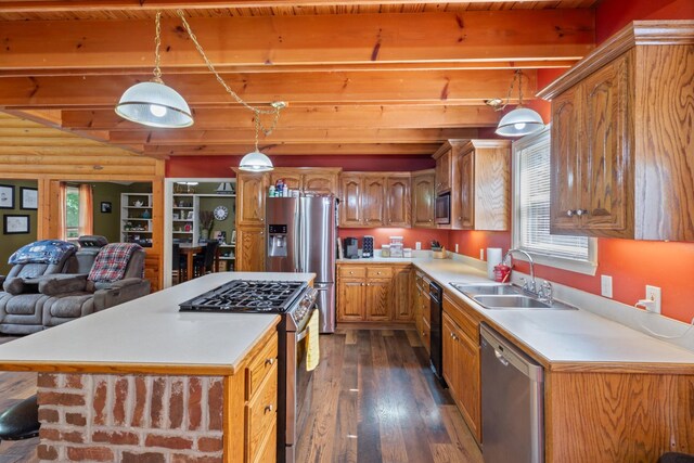 4357 Old Blacktop Rd, Mc Ewen, TN 37101 - kitchen with stainless steel appliances, a sink, dark wood-type flooring, healthy amount of natural light, and wooden ceiling with exposed beams