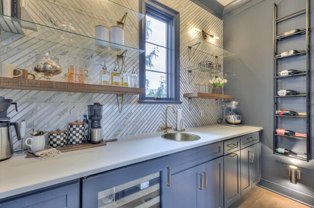1021 Julian Way, Murfreesboro, TN 37128 - indoor wet bar with beverage cooler, decorative backsplash, healthy amount of natural light, and wood finished floors