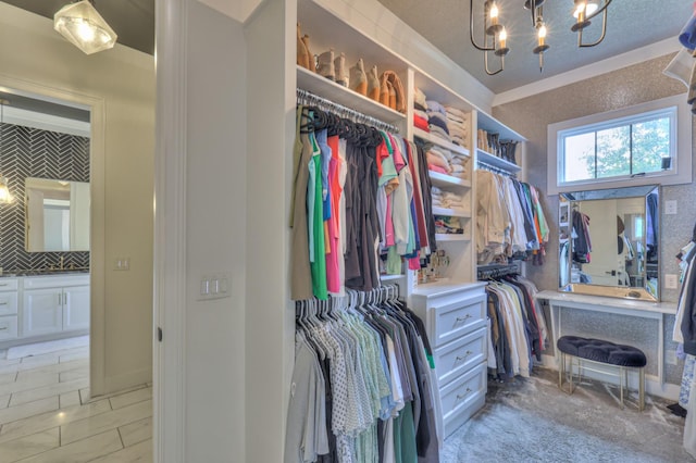 1021 Julian Way, Murfreesboro, TN 37128 - walk in closet with light marble finish floors and a chandelier