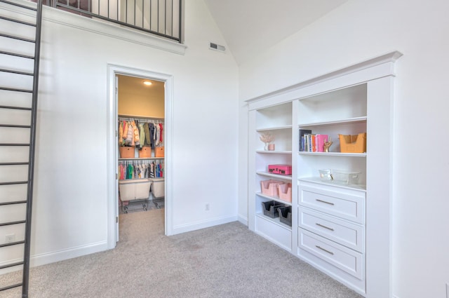 1021 Julian Way, Murfreesboro, TN 37128 - recreation room with light carpet, vaulted ceiling, and baseboards