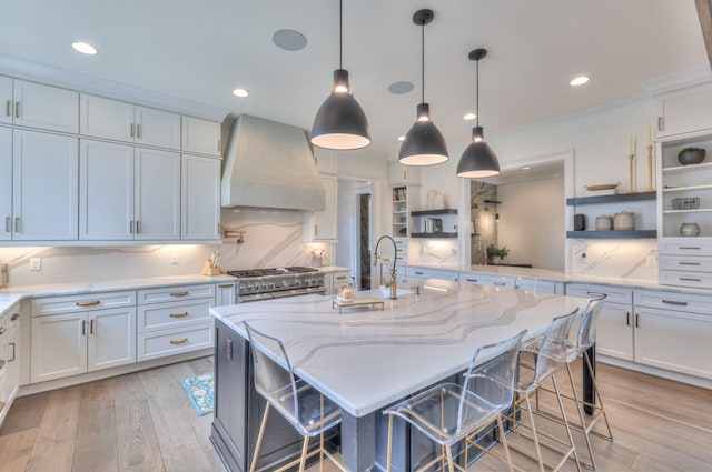 1021 Julian Way, Murfreesboro, TN 37128 - kitchen featuring premium range hood, open shelves, double oven range, light wood finished floors, and recessed lighting