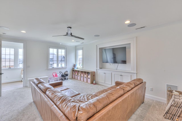 1021 Julian Way, Murfreesboro, TN 37128 - living room with light colored carpet, ceiling fan, plenty of natural light, recessed lighting, and crown molding