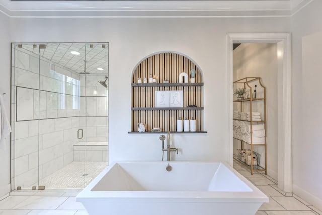 1021 Julian Way, Murfreesboro, TN 37128 - bathroom featuring a freestanding bath, a shower stall, tile patterned flooring, and baseboards