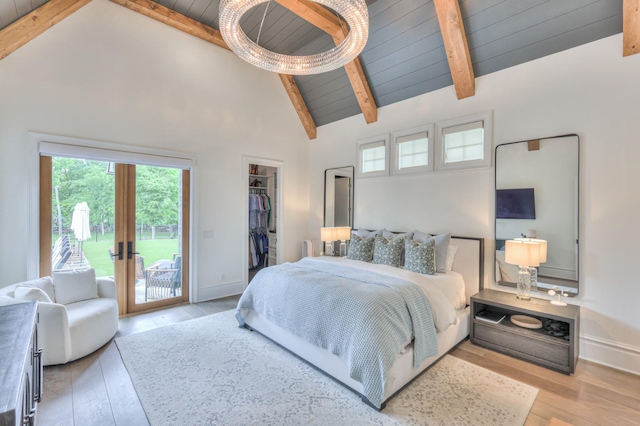 1021 Julian Way, Murfreesboro, TN 37128 - bedroom with access to outside, multiple windows, wooden ceiling with exposed beams, wood finished floors, and a spacious closet