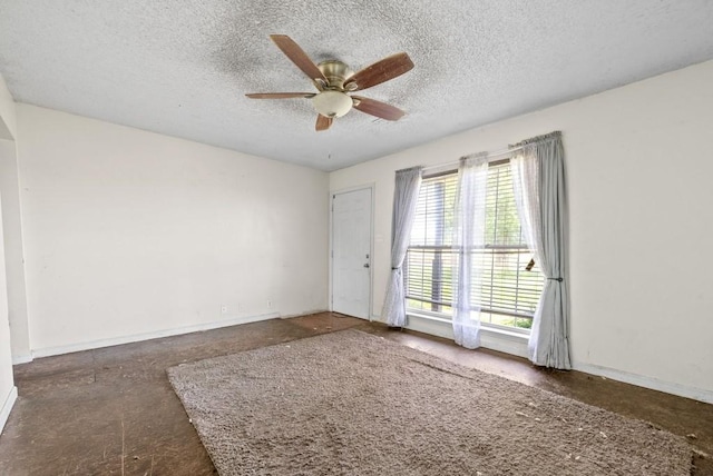 141 Bumpus Mill Rd, Oak Grove, KY 42262 - unfurnished room featuring ceiling fan, a textured ceiling, and baseboards