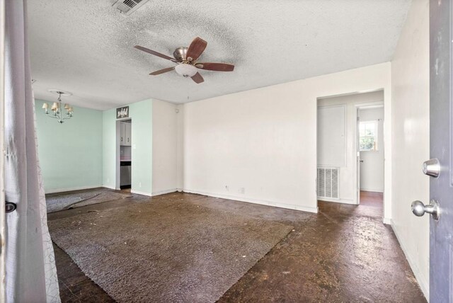 141 Bumpus Mill Rd, Oak Grove, KY 42262 - unfurnished room with a chandelier, baseboards, a ceiling fan, and a textured ceiling