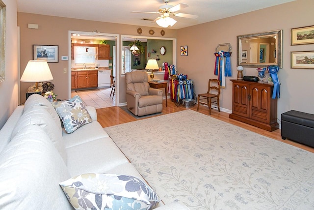 1130 Horse Mountain Rd Unit E, Shelbyville, TN 37160 - living area featuring ceiling fan and light wood-style floors