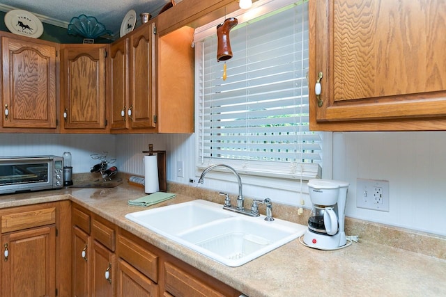 1130 Horse Mountain Rd Unit E, Shelbyville, TN 37160 - kitchen with a sink, brown cabinets, and light countertops