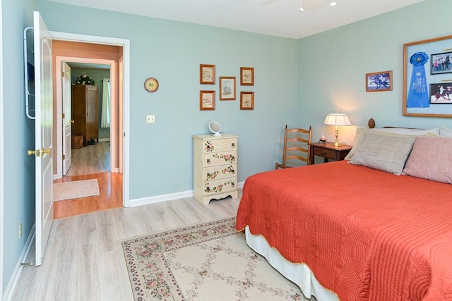 1130 Horse Mountain Rd Unit E, Shelbyville, TN 37160 - bedroom featuring wood finished floors, baseboards, and ceiling fan