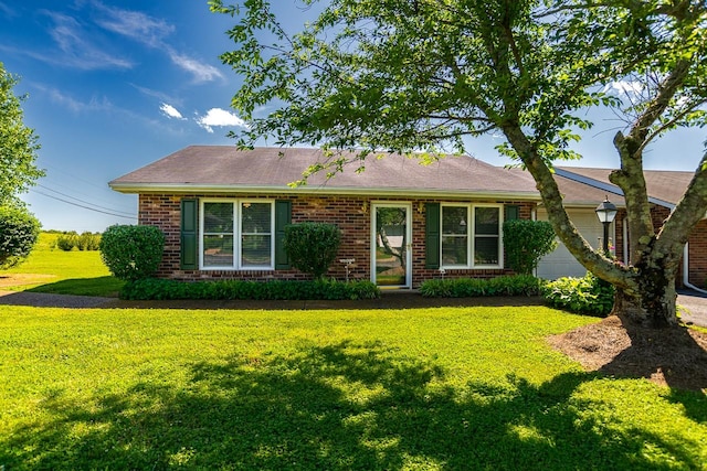 1130 Horse Mountain Rd Unit E, Shelbyville, TN 37160 - ranch-style house featuring a front lawn, brick siding, and roof with shingles