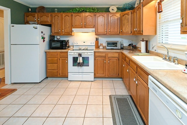 1130 Horse Mountain Rd Unit E, Shelbyville, TN 37160 - kitchen featuring white appliances, under cabinet range hood, a sink, ornamental molding, and light countertops