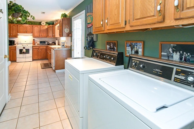 1130 Horse Mountain Rd Unit E, Shelbyville, TN 37160 - laundry area featuring washer and clothes dryer and light tile patterned floors