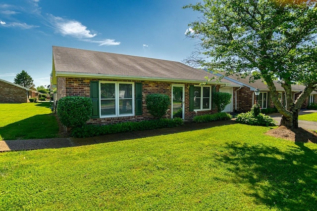 1130 Horse Mountain Rd Unit E, Shelbyville, TN 37160 - ranch-style home featuring brick siding, a front lawn, and roof with shingles