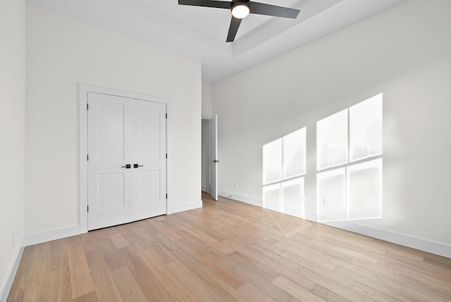 24 Fawn Mdws, Clarksville, TN 37043 - unfurnished bedroom featuring light wood-style floors, baseboards, and a ceiling fan