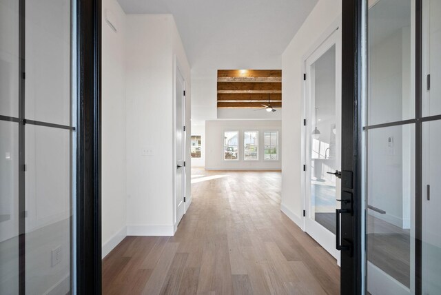 24 Fawn Mdws, Clarksville, TN 37043 - hallway with beamed ceiling, wood finished floors, and baseboards