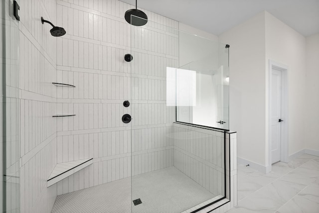 24 Fawn Mdws, Clarksville, TN 37043 - full bath with tiled shower, baseboards, and marble look tile flooring