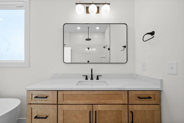 24 Fawn Mdws, Clarksville, TN 37043 - bathroom with vanity, a soaking tub, and a shower