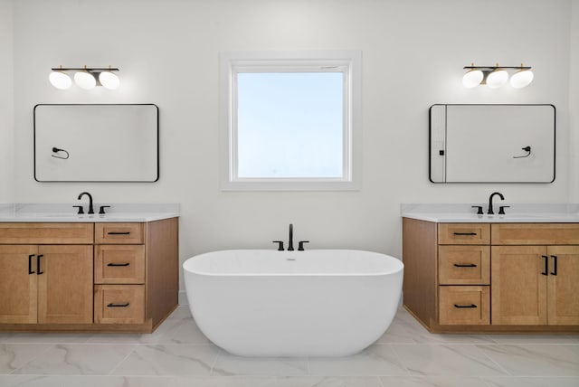 24 Fawn Mdws, Clarksville, TN 37043 - full bathroom featuring marble finish floors, two vanities, and a freestanding bath