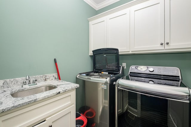 4423 Garcia Blvd, Murfreesboro, TN 37128 - laundry room with cabinet space, separate washer and dryer, and ornamental molding