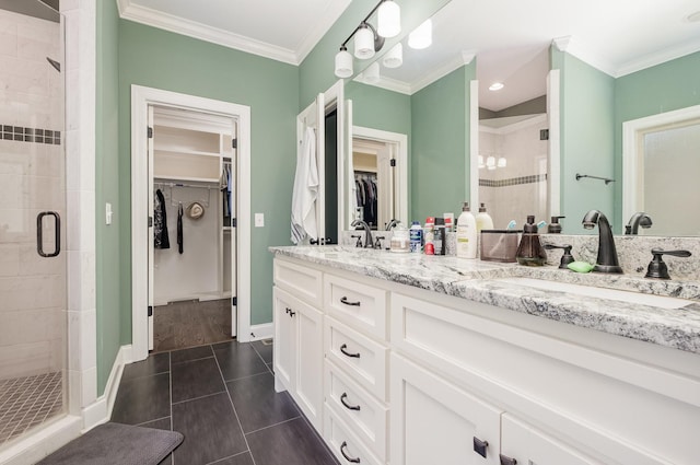 4423 Garcia Blvd, Murfreesboro, TN 37128 - bathroom featuring double vanity, a walk in closet, a shower stall, ornamental molding, and baseboards