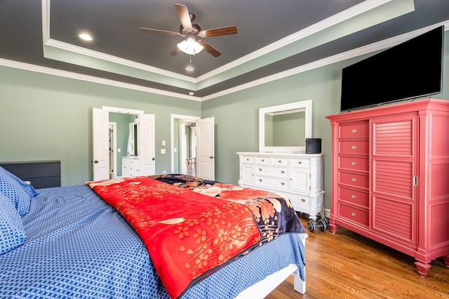 4423 Garcia Blvd, Murfreesboro, TN 37128 - bedroom featuring a raised ceiling, crown molding, wood finished floors, ceiling fan, and recessed lighting
