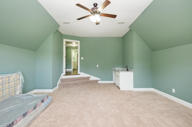 4423 Garcia Blvd, Murfreesboro, TN 37128 - additional living space with ceiling fan, light colored carpet, baseboards, vaulted ceiling, and a sink