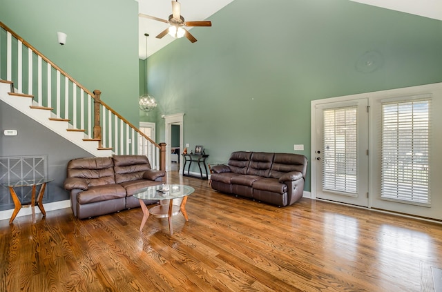 4423 Garcia Blvd, Murfreesboro, TN 37128 - living area with high vaulted ceiling, ceiling fan, stairs, wood finished floors, and baseboards