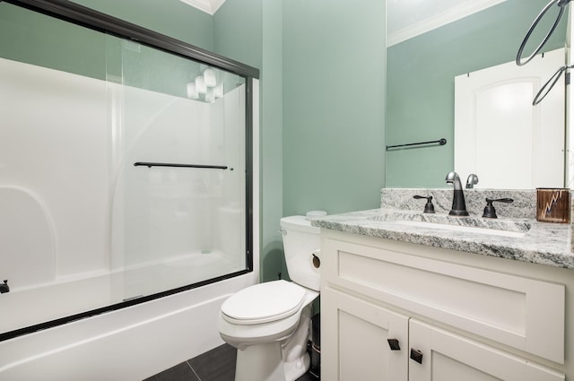 4423 Garcia Blvd, Murfreesboro, TN 37128 - full bathroom with ornamental molding, vanity, toilet, shower / bath combination with glass door, and tile patterned floors