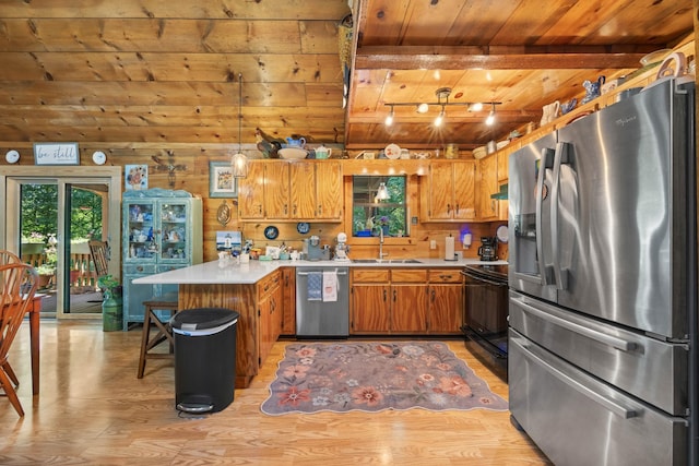 123 Hidden Trl, Dover, TN 37058 - kitchen featuring stainless steel appliances, wood ceiling with exposed beams, a peninsula, healthy amount of natural light, and light countertops