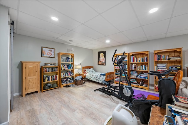 123 Hidden Trl, Dover, TN 37058 - workout area featuring wood finished floors, a drop ceiling, and recessed lighting