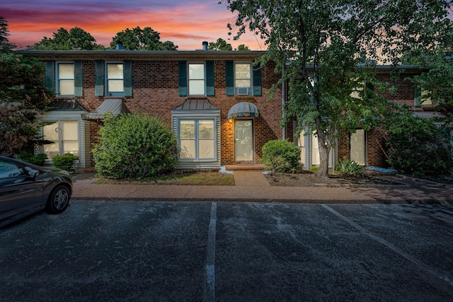 523 Williamsburg Dr, Nashville, TN 37214 - view of property featuring brick siding and uncovered parking