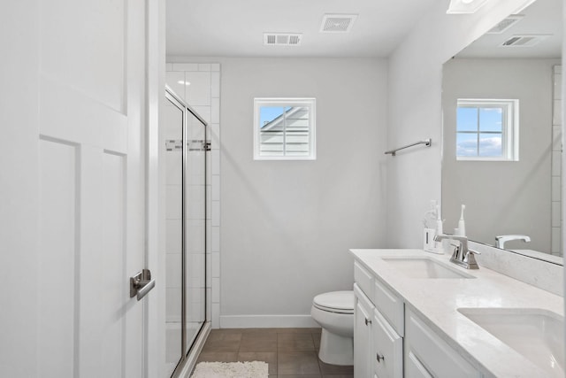 9420 Kaplan Ave, Brentwood, TN 37027 - full bathroom with healthy amount of natural light, toilet, and a shower stall