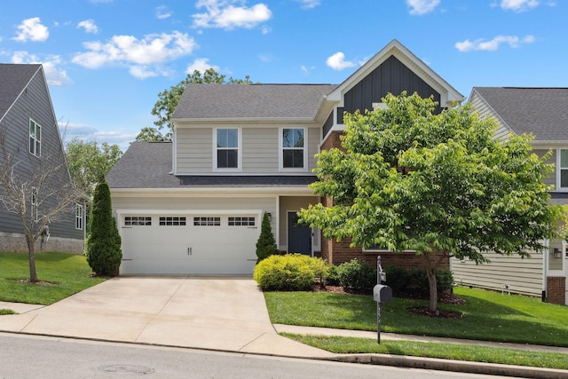 9420 Kaplan Ave, Brentwood, TN 37027 - view of front of home with board and batten siding, driveway, and a front yard