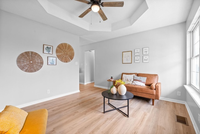 271 Golden Pond Ave, Oak Grove, KY 42262 - sitting room featuring a tray ceiling, light wood-type flooring, a ceiling fan, and baseboards