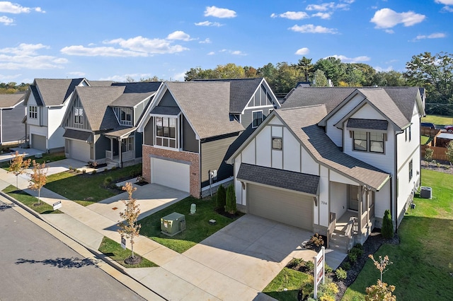 749 Caraway Ln, Nashville, TN 37211 - view of front facade featuring an attached garage, concrete driveway, board and batten siding, a shingled roof, and central AC unit