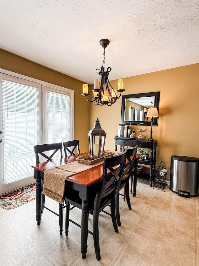 115 Lancaster Gate Pl, Murfreesboro, TN 37128 - dining room with a chandelier and a textured ceiling