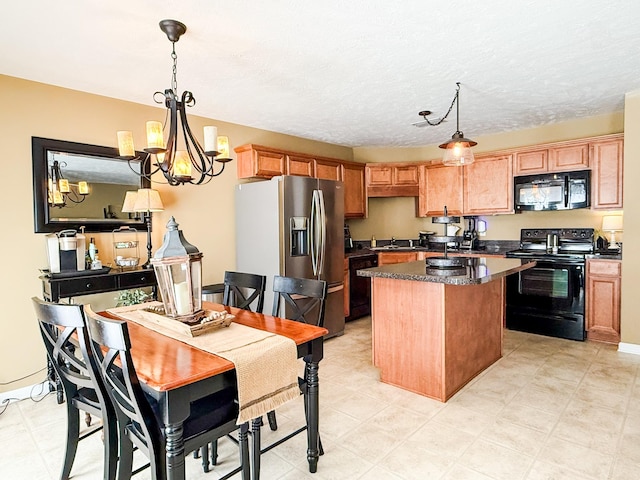 115 Lancaster Gate Pl, Murfreesboro, TN 37128 - kitchen featuring black appliances, a center island, a chandelier, a sink, and pendant lighting
