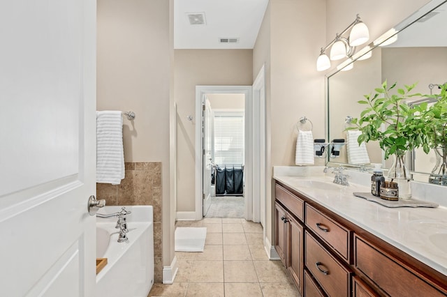 2520 Pebblecreek Ln, Murfreesboro, TN 37130 - bathroom featuring double vanity, a bath, and tile patterned floors