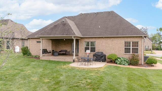 2520 Pebblecreek Ln, Murfreesboro, TN 37130 - rear view of property featuring a yard, a patio, roof with shingles, central air condition unit, and brick siding