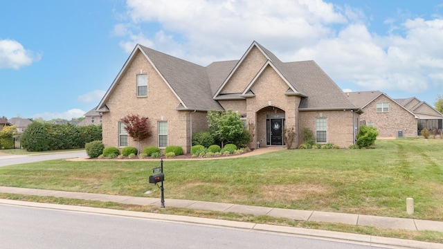 2520 Pebblecreek Ln, Murfreesboro, TN 37130 - traditional-style house featuring brick siding, a front lawn, and a shingled roof