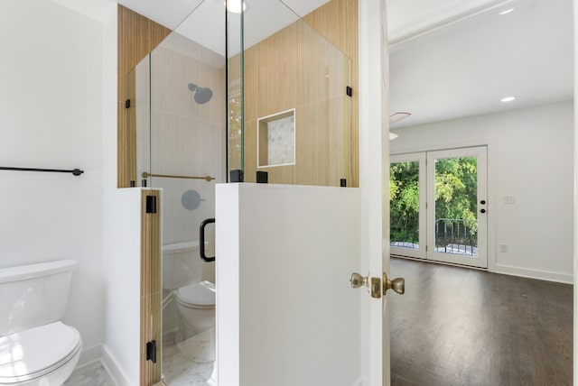 1305 Riverwood Dr, Nashville, TN 37216 - full bathroom with toilet, a stall shower, baseboards, and wood finished floors