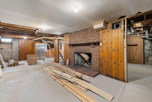 1305 Riverwood Dr, Nashville, TN 37216 - below grade area featuring a brick fireplace and wooden walls