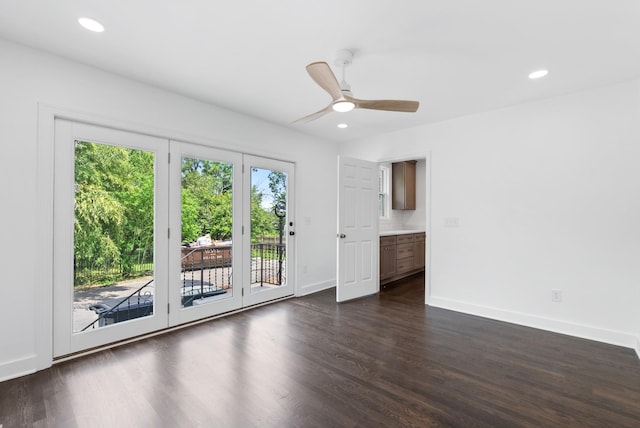 1305 Riverwood Dr, Nashville, TN 37216 - unfurnished room featuring dark wood-style floors, baseboards, a ceiling fan, and recessed lighting