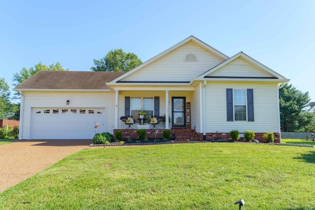 1101 Wedgewood Dr, Gallatin, TN 37066 - view of front facade featuring a porch, an attached garage, concrete driveway, and a front lawn