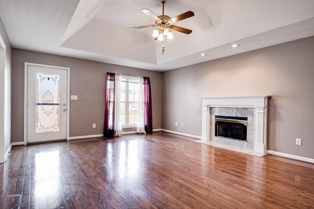 1101 Wedgewood Dr, Gallatin, TN 37066 - unfurnished living room featuring ceiling fan, wood finished floors, a fireplace, baseboards, and recessed lighting
