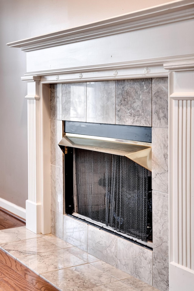 1101 Wedgewood Dr, Gallatin, TN 37066 - detailed view of a tile fireplace and baseboards